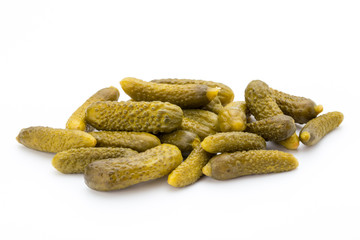 Marinated pickled cucumbers isolated on the white.