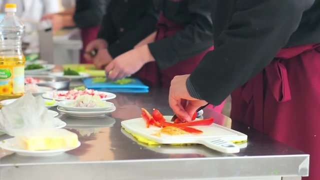 Close up shot of kitchener chopping grocery 