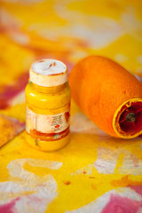 A closeup of artistic instruments, paints, paint roller and paper. The concept of creativity and fantasy development.