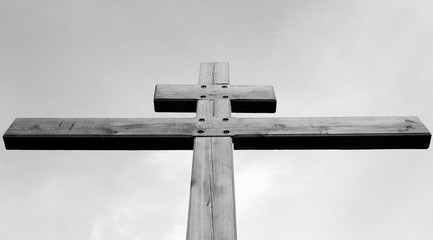 Wooden cross against the sky.