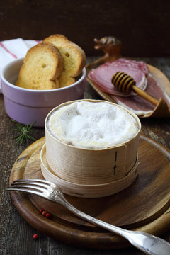 French Vacherin Mont d'Or cheese, cold cuts for fondue