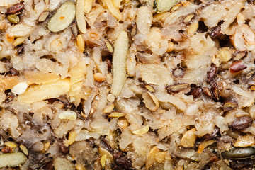 Detailed closeup whole grain bread with many grains