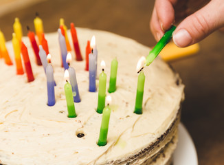 Lighting Candles on a Birthday Cake
