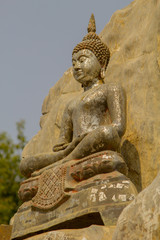 Fototapeta premium Buddha statue on the hill in buddhist temple at Wat Mai Kham Wan temple, Phichit,Thailand.