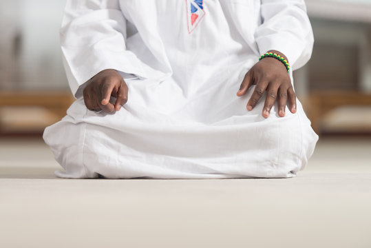 Young African Muslim Guy Praying