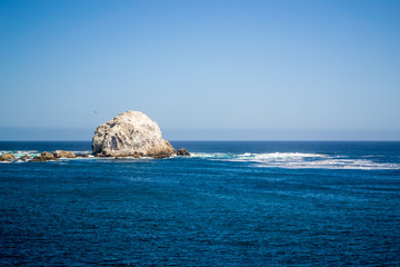 Big stone in the beach at Algarrobo, Chile.