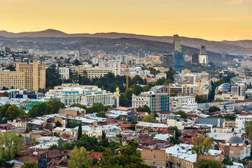 Obraz premium View on Tbilisi city on sunset. Georgia