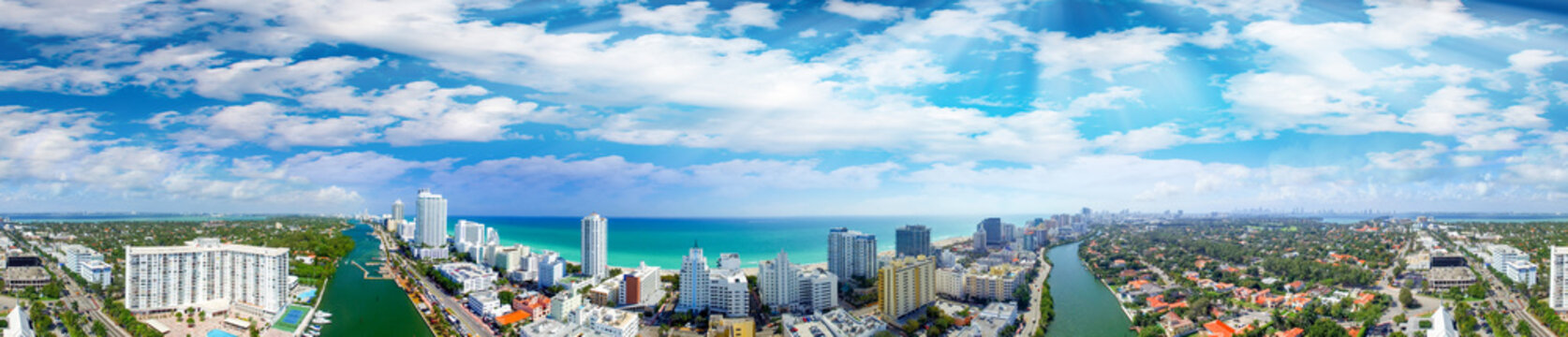 Miami Beach Buildings And Coastline - Panoramic Aerial View At Sunset