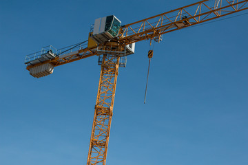 Naklejka premium Yellow contruction crane