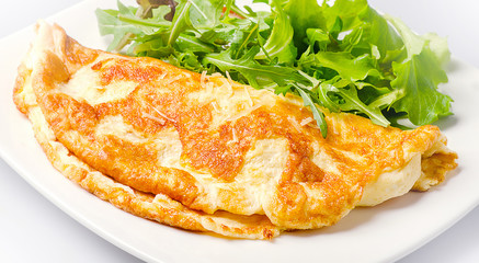 Omelette with fresh salad  for traditional breakfast