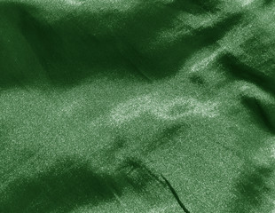 Green color textile surface.