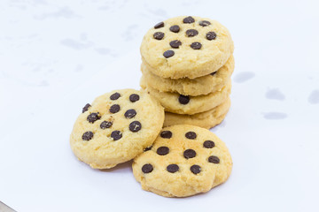 Chocolate chip cookie on white background