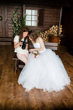 Photographer shows the bride had just taken photos