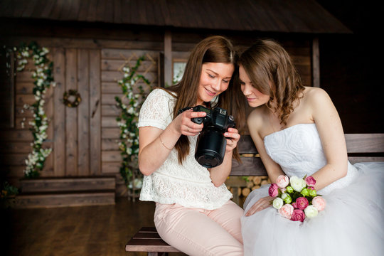 Photographer shows the bride had just taken photos
