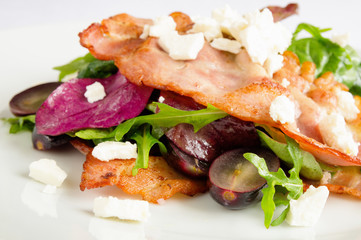 brisket pork, black grapes, and leafy salad with bryndza cheese and marinade dressing 