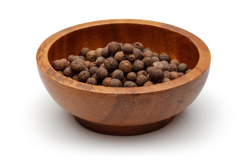 Allspice in wooden bowl