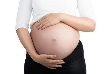 Belly of a pregnant woman isolated on white with clipping path.
