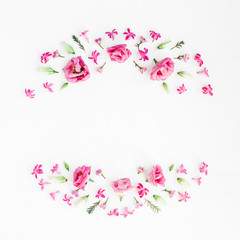 Obraz na płótnie Canvas Flowers composition. Wreath made of various pink flowers on white background. Flat lay, top view