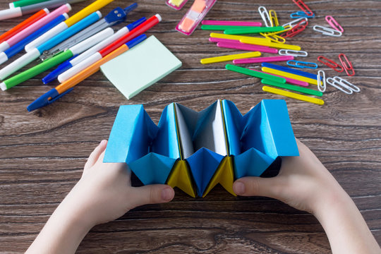 Children's office organizer made of paper handmade. Project of children's creativity, handicrafts, crafts for children.