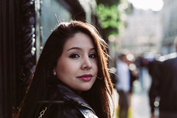 Portrait of young woman on the street