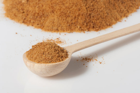 Sugar cane close up - measuring tablespoon 