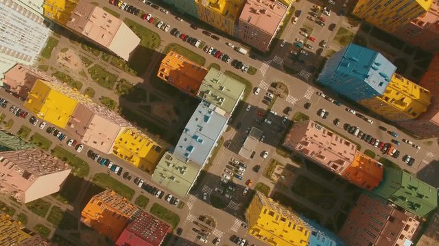 Above top view cozy comfortable colored houses in a European city 4K UHD aerial
