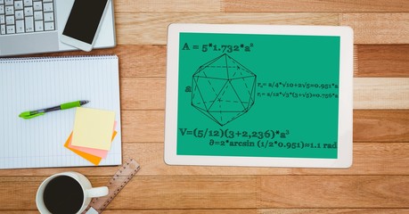 Math diagram and equations on digital tablet by note pad