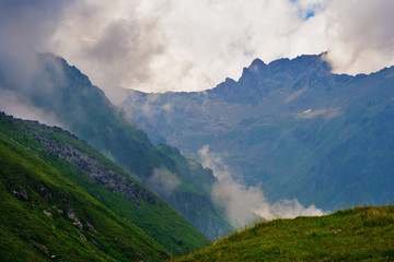 Evening fog in the valley between the mountains
