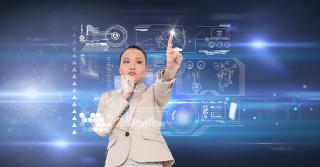 Digital composite image of businesswoman touching virtual screen