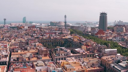 Obraz premium Barcelona rooftops and distant seaport, Spain