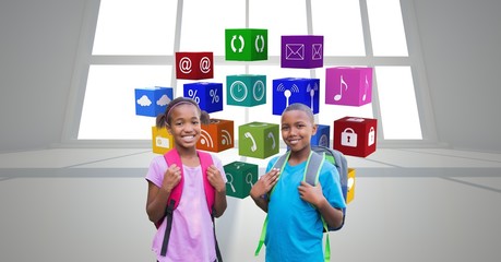 Portrait of school children standing against apps icons