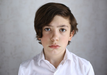 sad lonely offended teen boy portrait