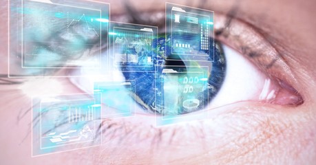 Extreme close-up of human eye with interface screens