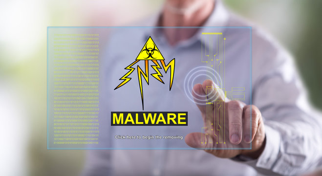 Man touching a malware concept on a touch screen