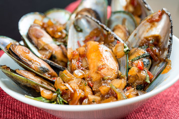 Mussel with white wine sauce on table