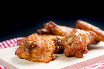 delicious fried chicken wings with sauce