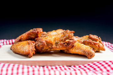delicious fried chicken wings with sauce