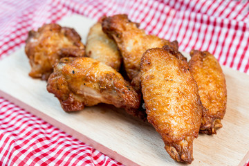delicious fried chicken wings with sauce