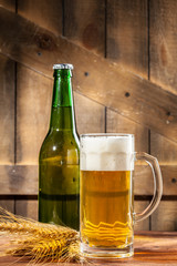 Glass of beer and beer bottle