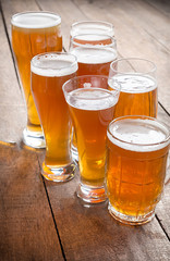 glass beer on wood background