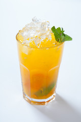 Summer lemonade with orange, ice and mint
