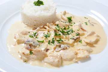 stewed chicken with white rice and mashroom sauce