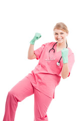 Cute medical nurse making success gesture