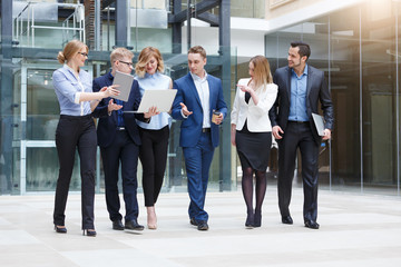 Business team, businesspeople group at modern bright office interior