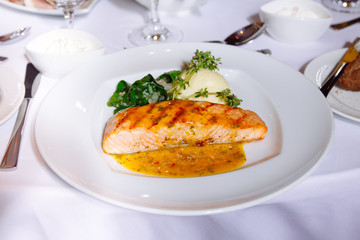 Grilled Salmon Steak with Spinach,Mash potato, souse