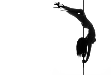 Obraz premium pole dance woman silhouette