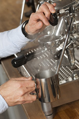 barista steaming milk