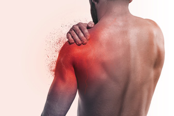 Man with pain in shoulder
