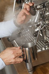 barista steaming milk
