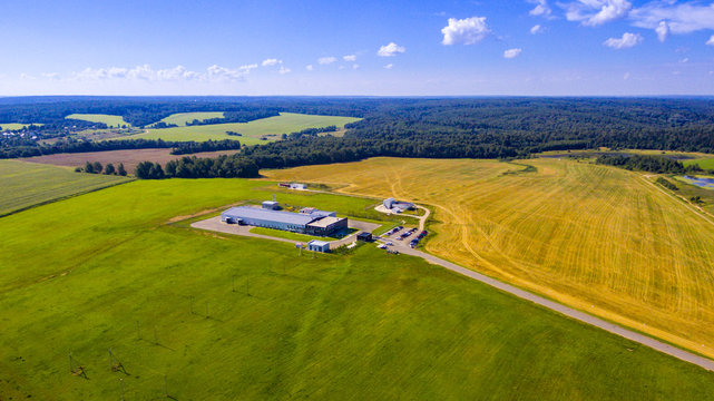 Aerial view on modern farm buildings